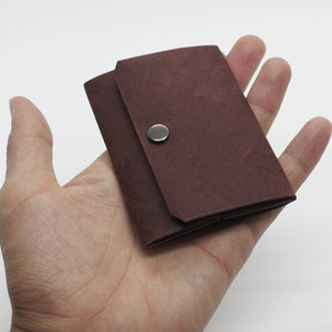 Slim, minimalist, eco-friendly paper wallets that help you live simply. Kamino Slim Coin Purse keeps your coins in the smallest profile.